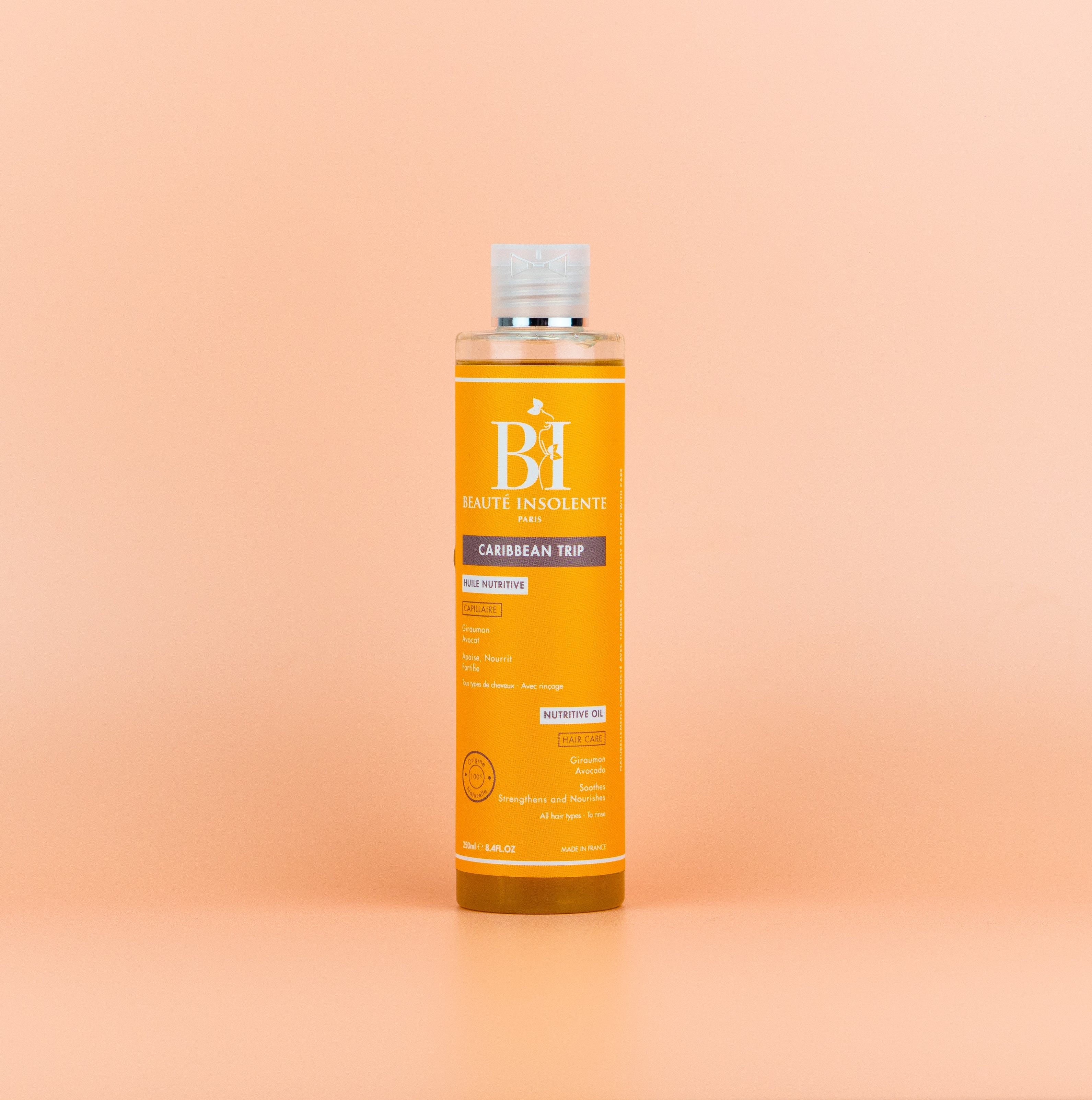 Huile nutritive pour cheveux texturés Beauté Insolente A01, nourrissante et réparatrice pour des cheveux doux, brillants et bien hydratés.