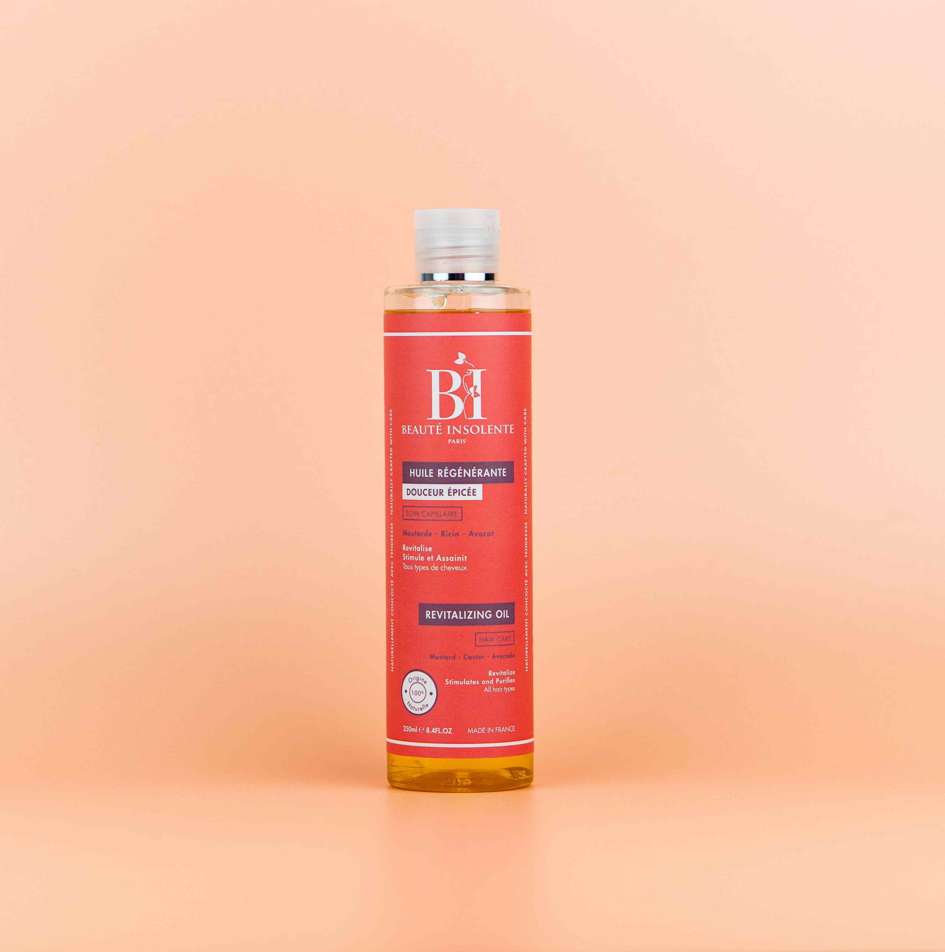 Huile régénérante pour cheveux texturés Beauté Insolente A01, formulée pour restaurer la vitalité des cheveux et prévenir la casse tout en apportant brillance et douceur