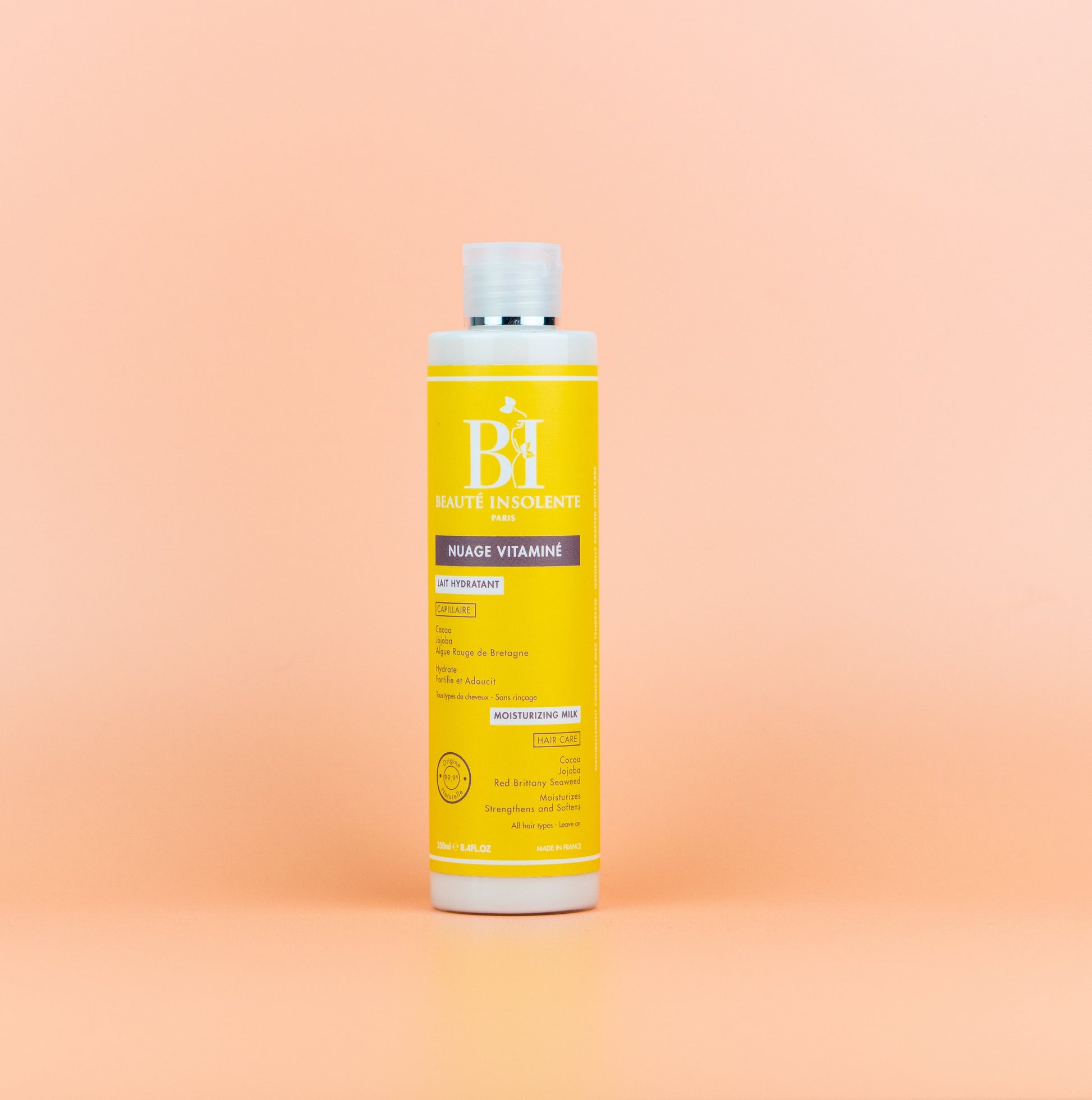 Lait hydratant pour cheveux texturés Beauté Insolente A01, formulé pour nourrir en profondeur et maintenir l'hydratation des cheveux tout en définissant les boucles.