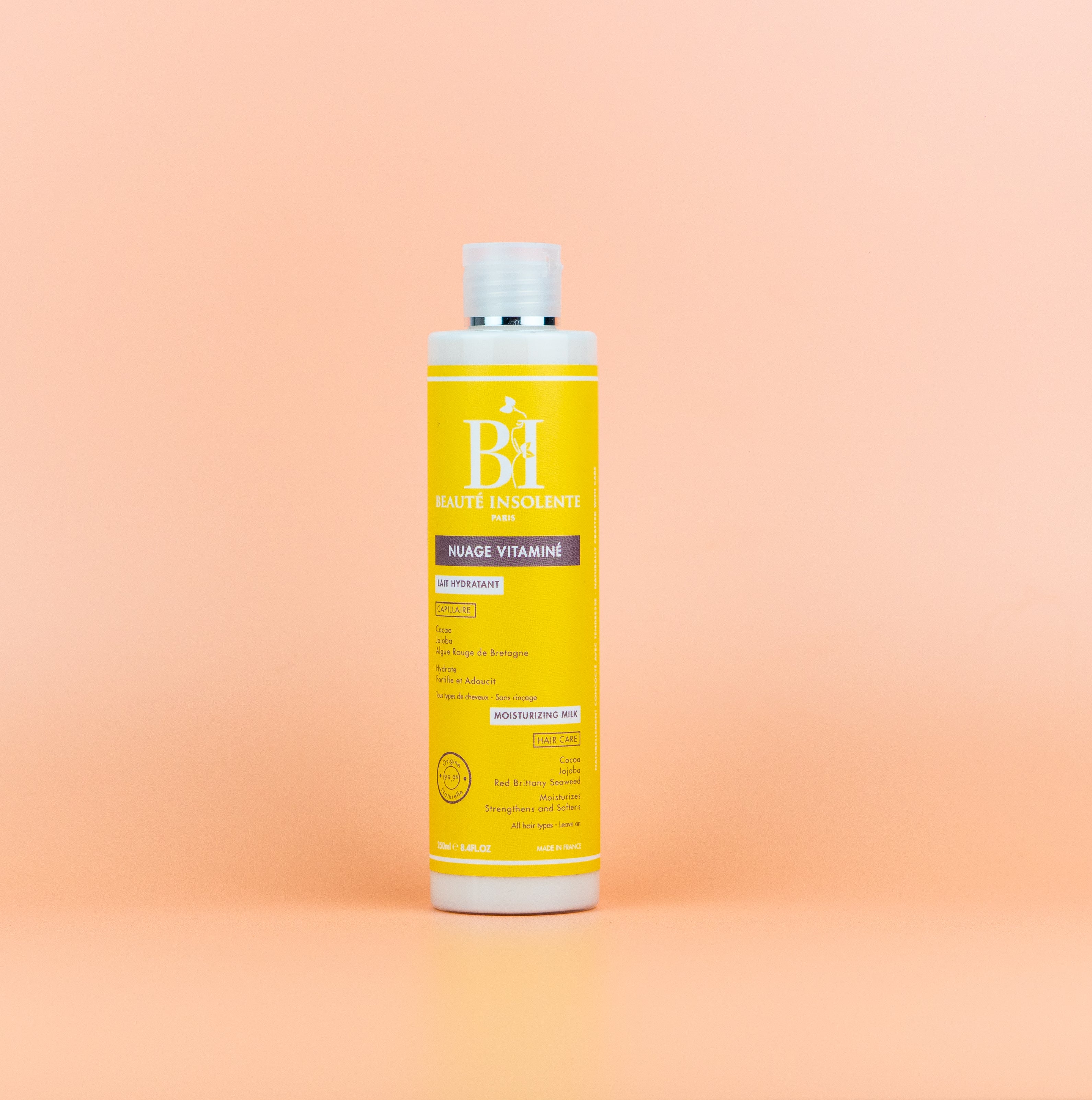 Lait hydratant pour cheveux texturés Beauté Insolente A01, formulé pour nourrir en profondeur et maintenir l'hydratation des cheveux tout en définissant les boucles.